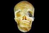 Realistic, Polished, Banded Orange Calcite Skull - Fluorescent! #150925-2